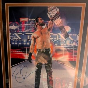 Seth Rollins autograph picture of when he won the WWE world heavyweight title.